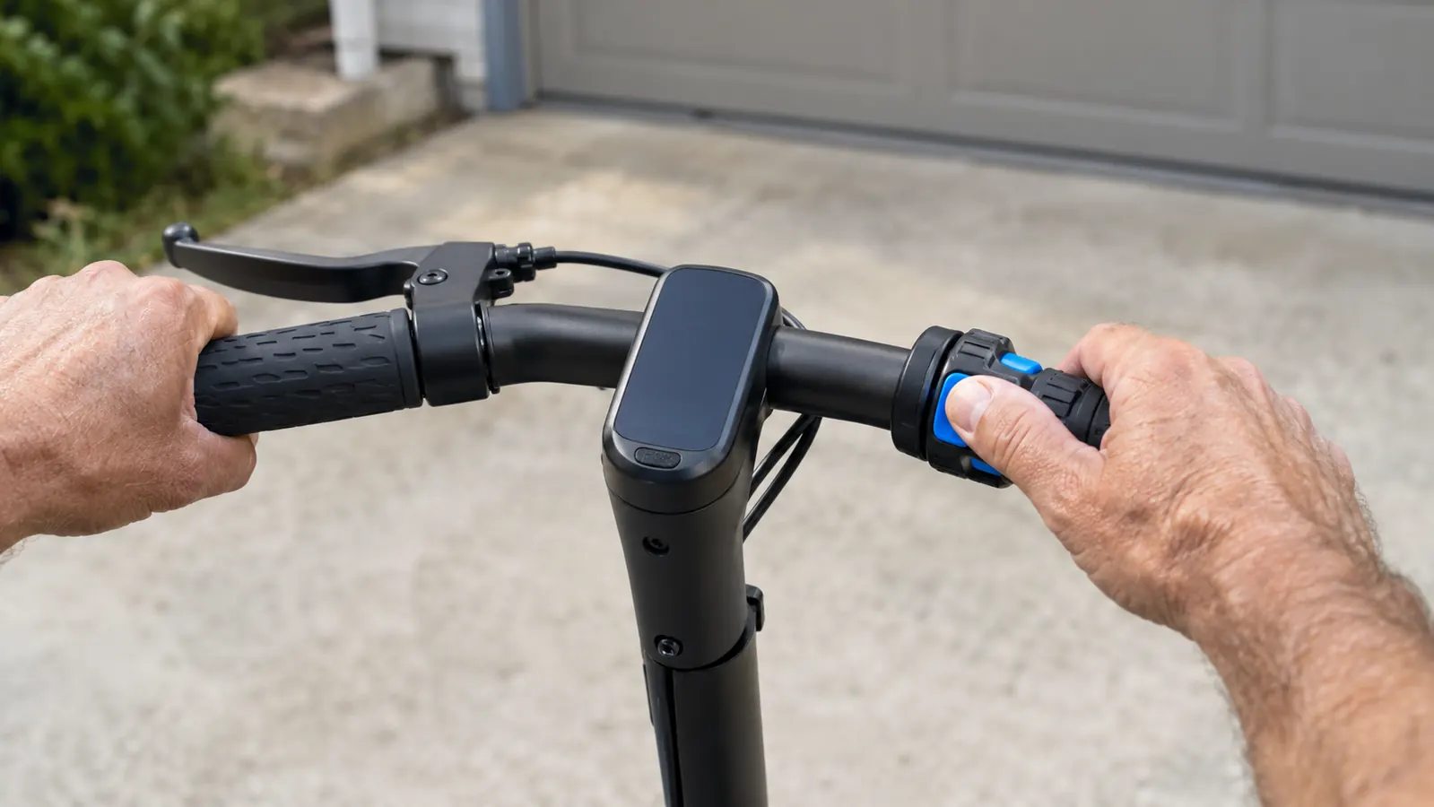 Close view of the thumb throttle on a kids electric scooter